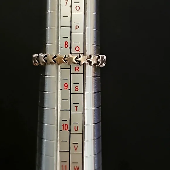 Sterling silver ring with stars all the way around the band. Infinity star band - Picture 1 of 4